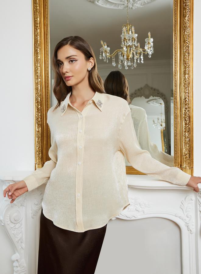 ستايلي بلوزة بتفاصيل براقة وأكمام طويلة - Image 4